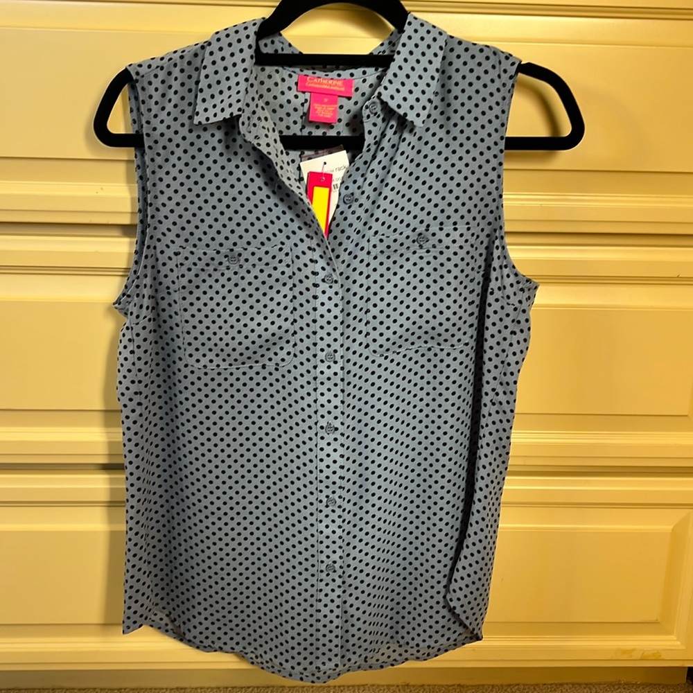 Button up sleeveless top.